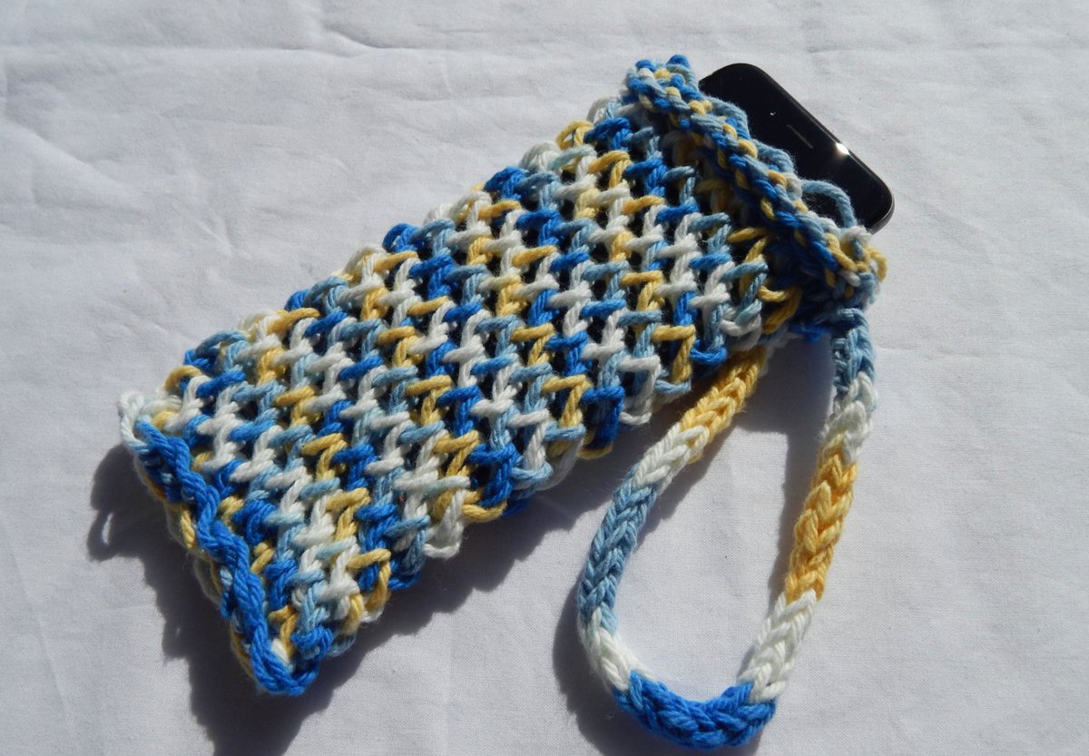theramblingyarn's tweet photo. Wristlet Phone Case Knit in Yellow, Blue, White https://t.co/AfsE9r9omK #Etsy #BlueKnitCase https://t.co/868AQNfdi6
