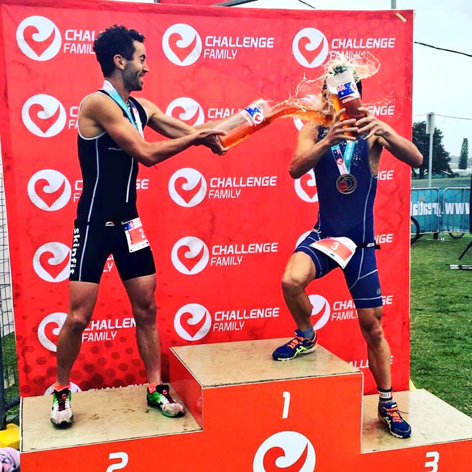 TriathlonZone's tweet photo. Housemate's @mainy_tri &amp; @matthewpellow celebrate sharing the podium today at #challengeforster https://t.co/xteud0CHfg