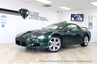 edmunds's tweet photo. #Mitsubishi 3000GT was our most popular #UsedCaroftheDay this week! AWD, manual & GREEN! https://t.co/mzFuCKsT3r https://t.co/hjQ8pq7ZFc