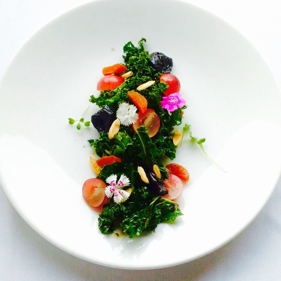 chefutkarsh1's tweet photo. Curly kale salad, maple balsamic dressing, frozen red grapes, prunes, apricots, toasted almonds, edible flowers https://t.co/LfkQdXCGCi