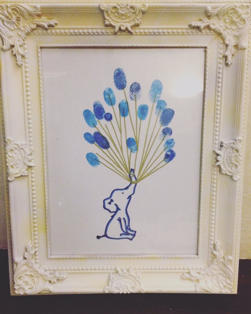 Definitely took inspiration from #Pinterest Finger print balloons. I drew the elephant. #handmade #babyshower #craft