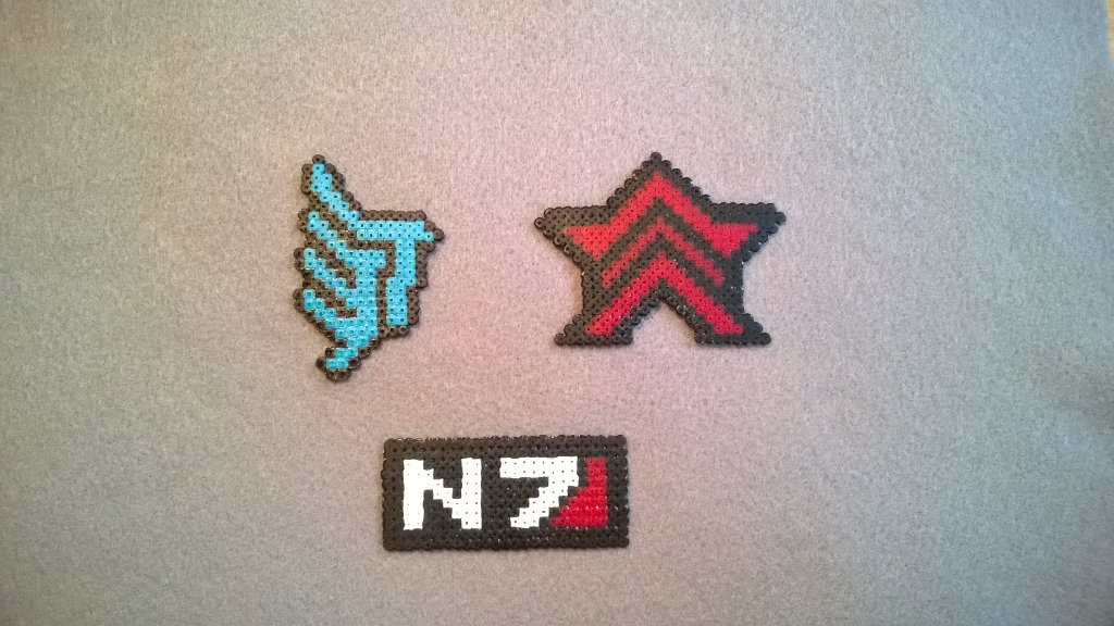 WiseBeadz's tweet photo. We made these hope you like #n7 #masseffect #n7day #paragon #renegade #hama #hamaart #minihamabeads #hamabeads https://t.co/tXc6czI3CN