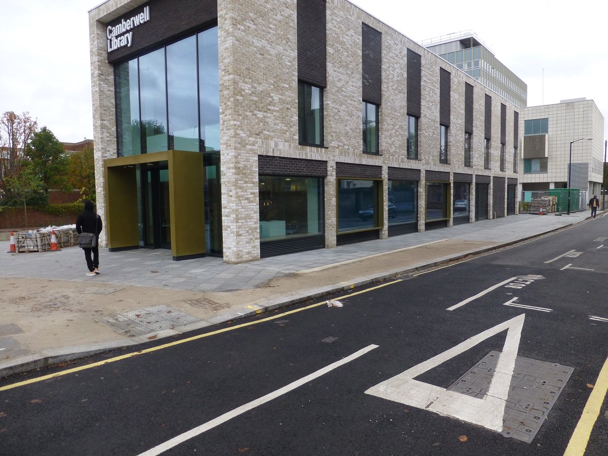 CoolCatsCafe's tweet photo. Lovely new library in Camberwell, but don't you hate it when you run out of pavers with a few sq metres left to do? https://t.co/yd7wxLc3nf