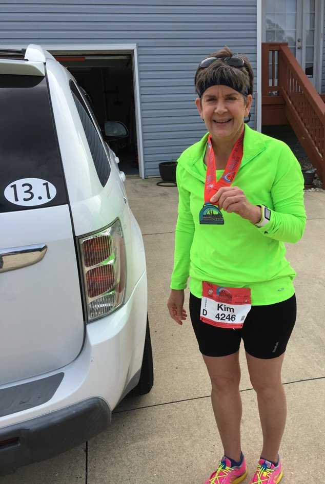 mommarific's tweet photo. Just ran my 1st half marathon &amp; enjoyed every minute of it! Happy  w/my time of 2:33:11 #obxmarathon #notbadfor52 https://t.co/lzEZMWSu6b
