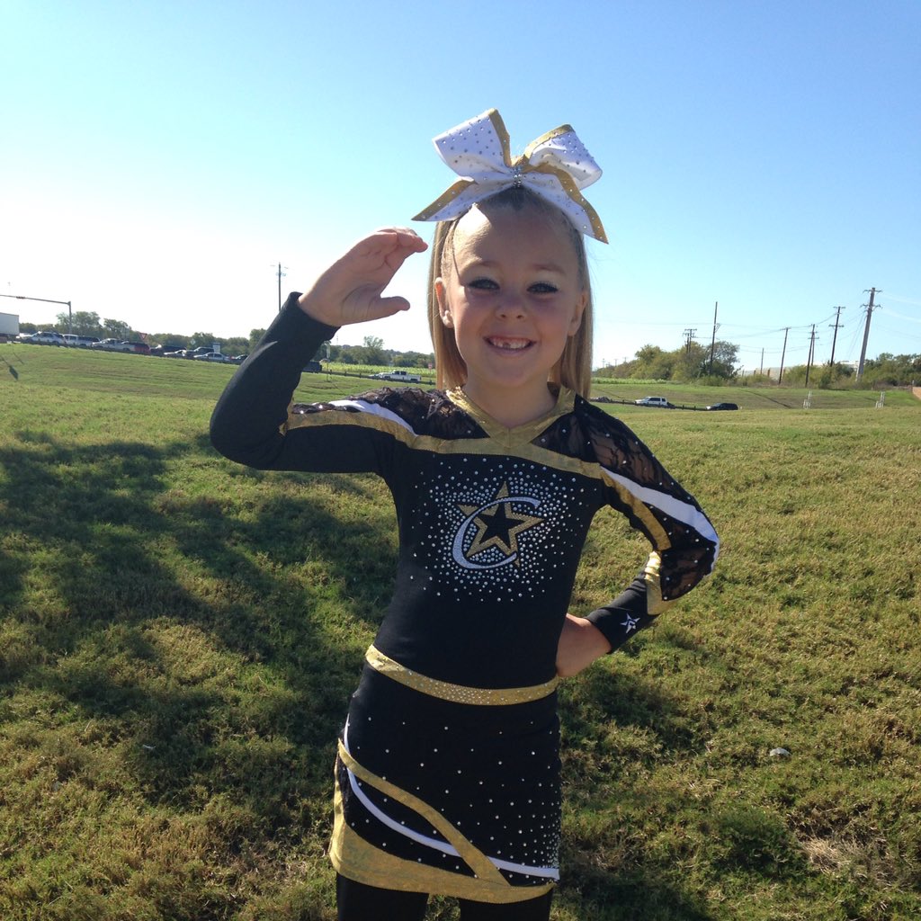 lyndshollis's tweet photo. She is ready to hit the mat and show the crowd what being a Champion is all about! #ccatorch @ChampionCheerAS https://t.co/uY0DUDwqxX