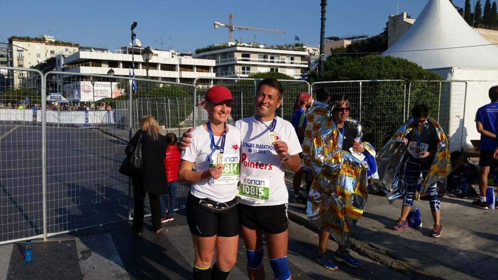KrunoslavW's tweet photo. My wife and I, our first marathon. Athena. https://t.co/HTJNpT3Mbr