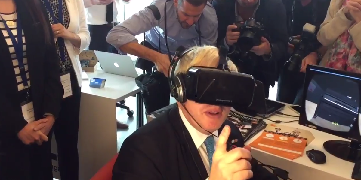indy100's tweet photo. Boris Johnson tries on VR headset... barks like a dog https://t.co/xQQsiHwD3A https://t.co/zMqx21xrPk