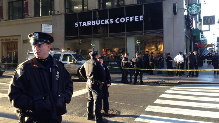 latimes's tweet photo. One dead, two wounded in shooting near New York's Penn Station https://t.co/kPfdx5QRsB https://t.co/NQkdz1d9TP