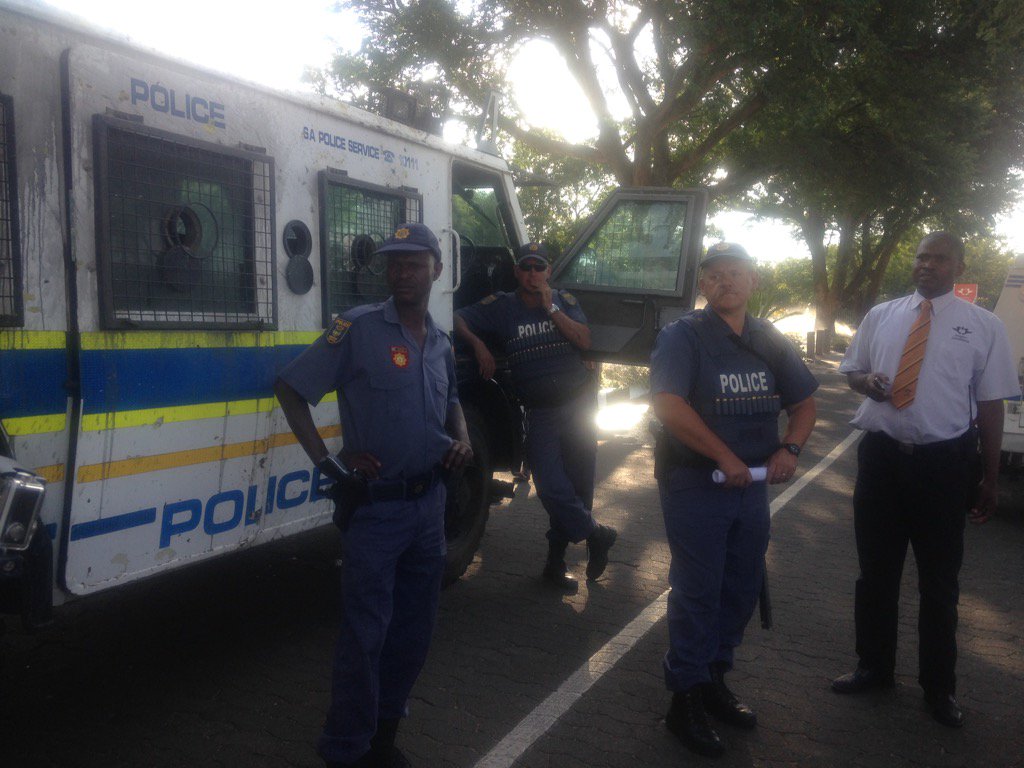 POWER987News's tweet photo. #EndOutsourcing #UJ Police want to address one student leader. Students say they're all leaders. https://t.co/yqKk56yBmT