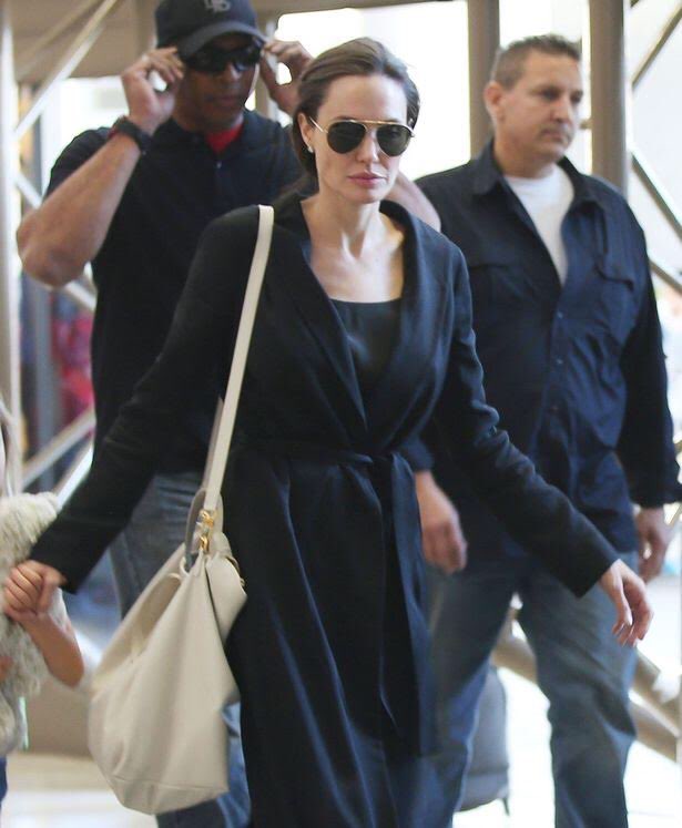 Cuyana on X: Spotted at LAX - Angelina with our oversized