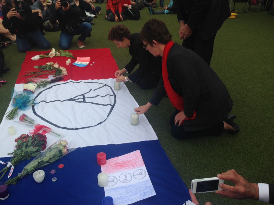 James_Baker77's tweet photo. Mayor Celia Brown and Ambassador Florence Jeanblanc-Risler light candles in memorial of the Paris attacks https://t.co/GaYVvEMoM1