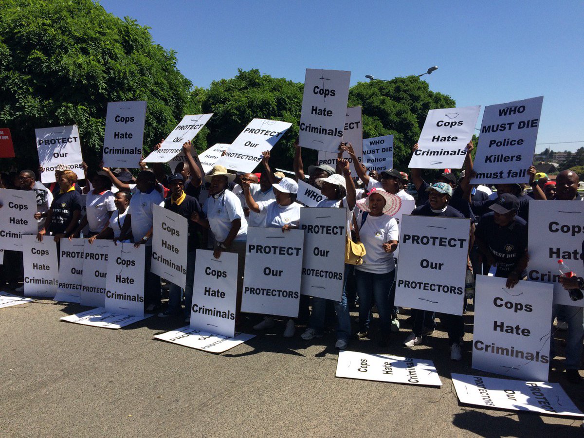 nzimandebafana's tweet photo. SAPU members outside Krugersdorp Magistrate's Court to support the 3 officers in the Khululekani Mpanza case @eNCA https://t.co/TGcu55bLLr