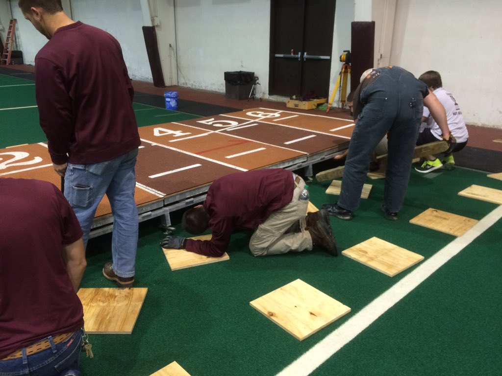 VT_groundscrew's tweet photo. Setting up the track in the Rector Field House. https://t.co/kQppJuF6K6