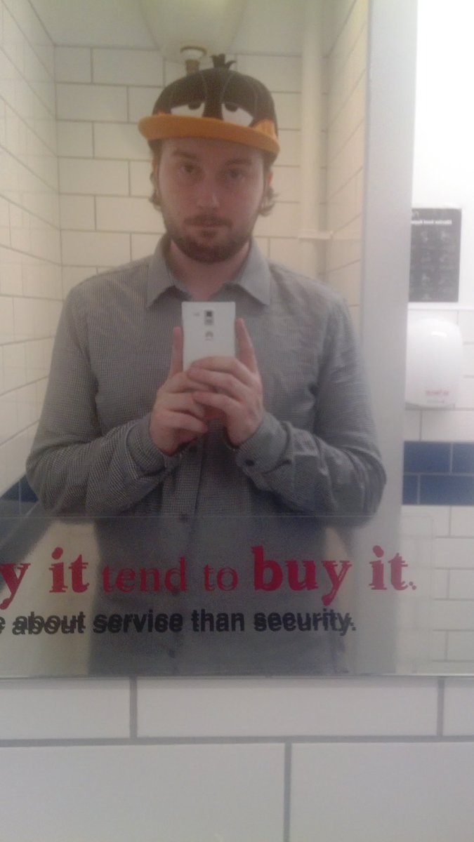 Just_Jolty's tweet photo. @PupFoon @PupRex1 I'm afraid a work bathroom selfie will have to do (#classypup) ignore the hat I was leaving work https://t.co/Vz2T4UljFz