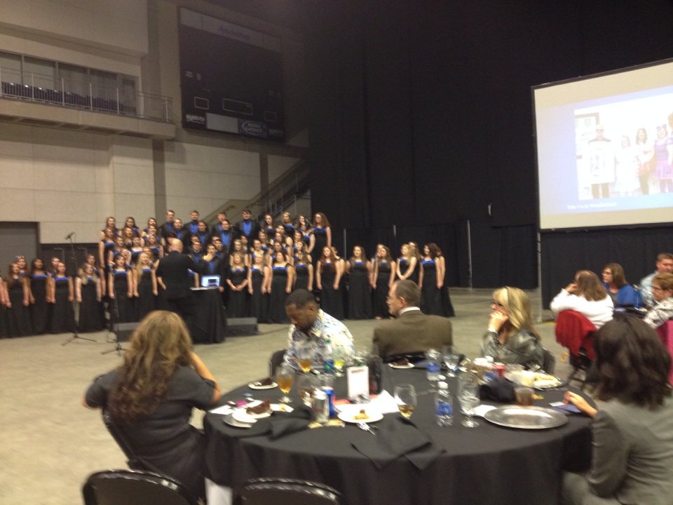 Bdrumartin's tweet image. Keynoter @ByronvGarrett at #piketitleIconference enjoying singing by Pike Central  #FundtheArts #SupportourKids