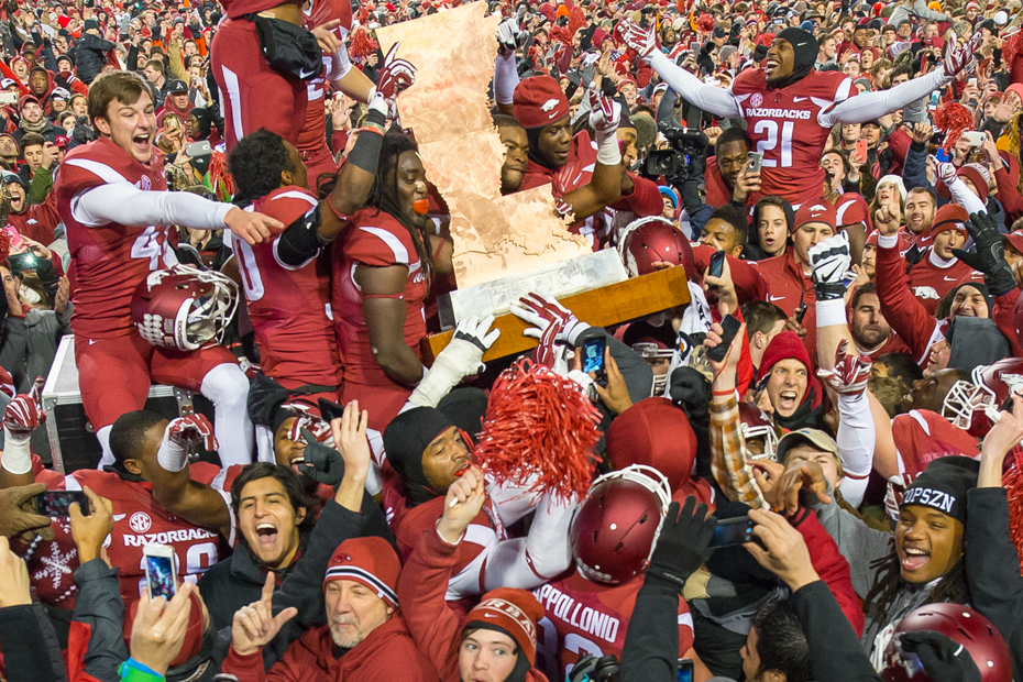 UArkansas's tweet photo. Tradition Tuesday: Watch Arkansas battle LSU to keep the Golden Boot, Saturday at 6:15 on @ESPN. 🏈🏆🐗 #WoooPig #UARK https://t.co/giJY7BI04P