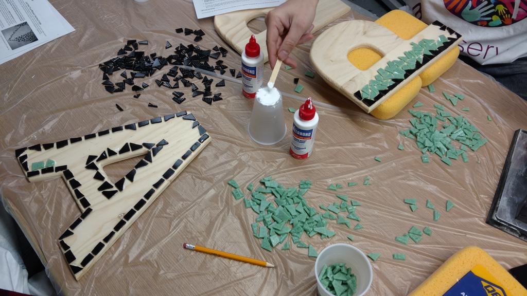 JimWicksmoto's tweet photo. Mosaics, shelving and Jeff Miller in the works at Moto serve. https://t.co/CPt2YXWWPu