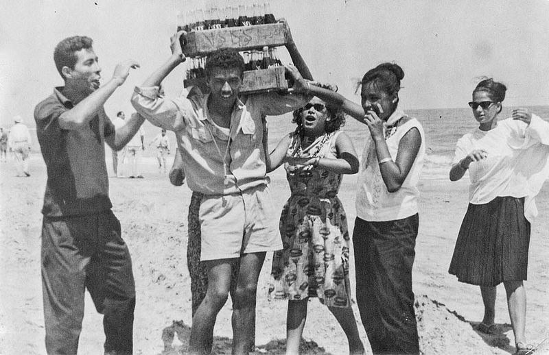 mid-20th century #Egypt'ians getting "excited" over Coca-Cola on a, according to legend, a "beach." #Alexandria