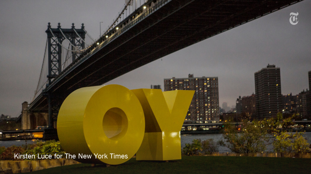 nytimes's tweet image. An art sculpture that says “YO” if you are looking from Manhattan or “OY” from Brooklyn nyti.ms/1Hx4neX