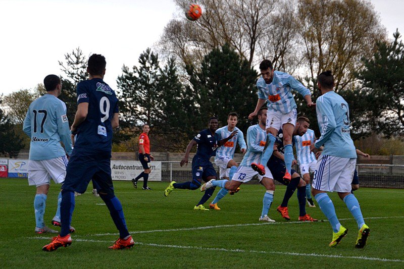 Aleksandar Damchevski heads the ball; photo: Slovacko