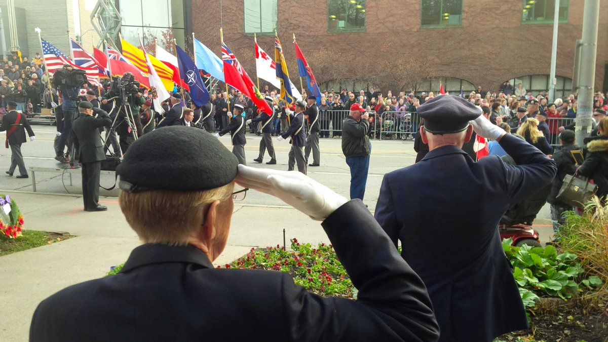 DaieneVernile's tweet image. Saluting arrival of flags at Cenotaph in @DTKitchener. #RemembranceDay2015 #LestWe Forget.