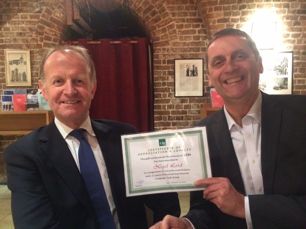 CTGinc's tweet image. UK director Graham Ring, right, recently honored consultant Nigel Lord for 15 years. Congrats, Nigel! #CTGatwork