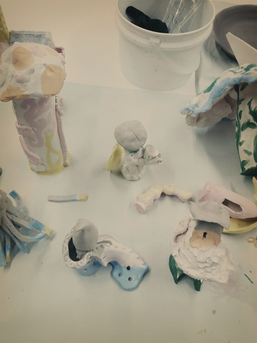 d_woolfe's tweet photo. Glazing ceramic city @RDCVisualArt #clay #whimsical #cityscape https://t.co/P5dYr2YJgf
