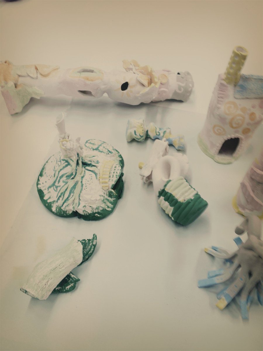 d_woolfe's tweet photo. Glazing ceramic city @RDCVisualArt #clay #whimsical #cityscape https://t.co/P5dYr2YJgf