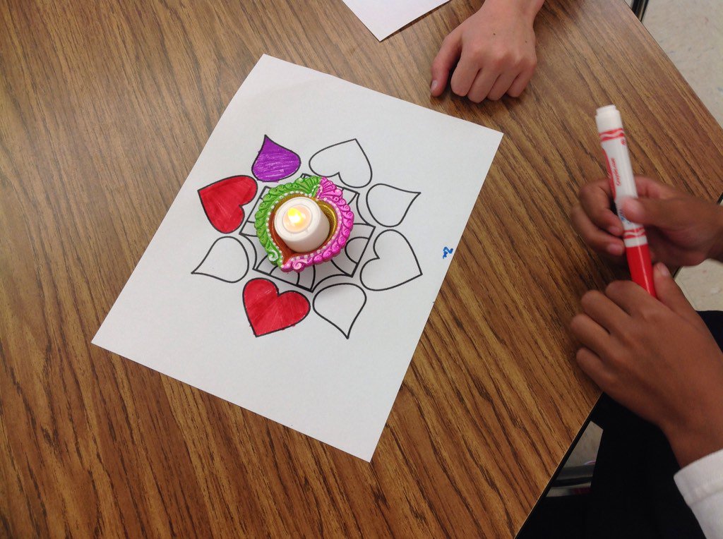OSPiKids's tweet image. Today we learned about Diwali from Ari&apos;s Dad. We made rangolis, learned a dance, and got some sweets!