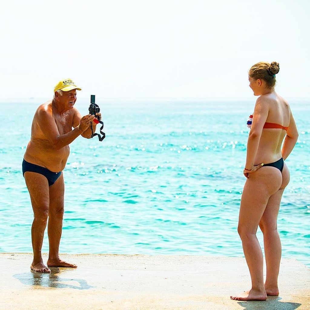 ThassosNow's tweet photo. August of 2014. A girl tries to take a selfie at the small port on Golden Beach. The old man offers to help. He ask… https://t.co/U3bXV7EszJ