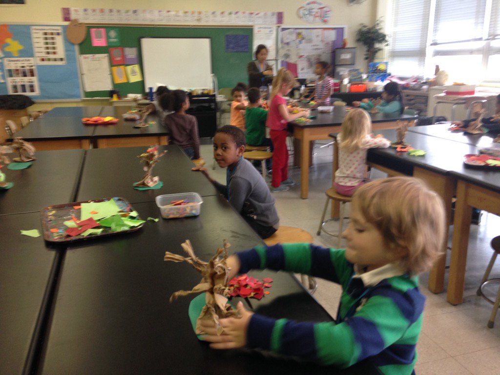 Berkshire artists are sculpting trees with Ms Roberts. Very smart kindergarten children.