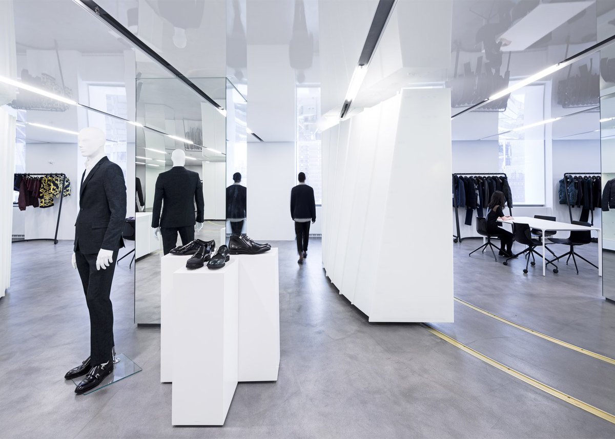 dezeen's tweet photo. Light-filled showroom for created for Versace's New York headquarters: https://t.co/ry5Y89xMpK #interiordesign https://t.co/R7YmJfAnal