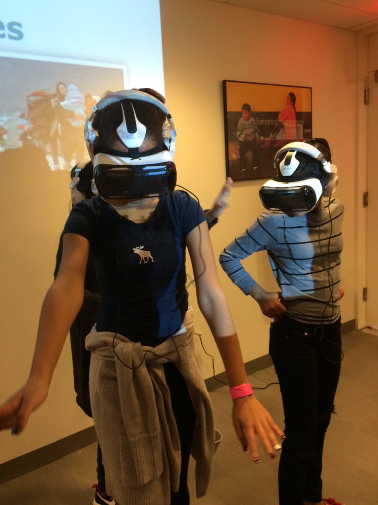 SDGaction's tweet photo. Kids from @IS125Q watching #CloudsOverSidra at the @UN #VR4Dev #action2015 https://t.co/PBW1vBntWu