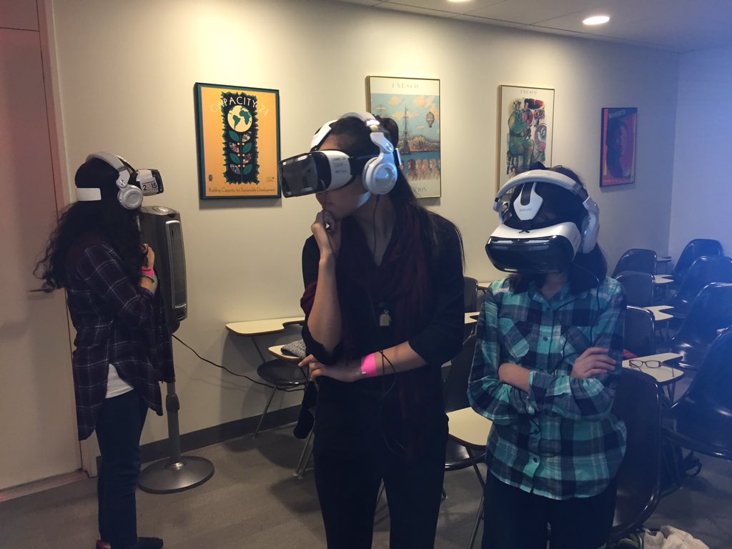 SDGaction's tweet photo. 13 year olds from @IS125Q experience Sidra's story w/ @UN visitors center #Cloudsoversidra #VR4Dev #childrenofsyria https://t.co/QtcHvvHinc