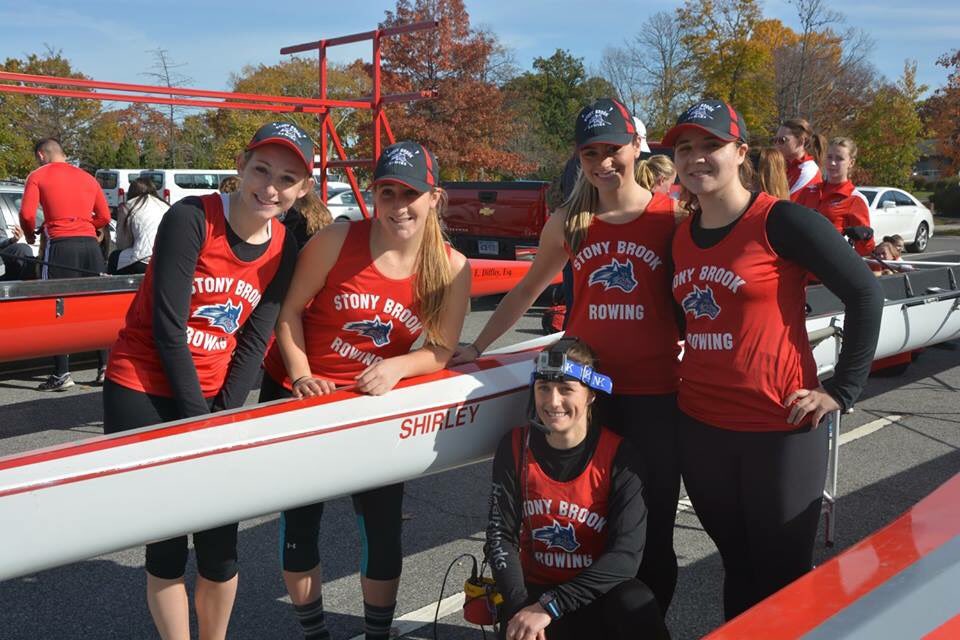 SBUCrew's tweet photo. Another picture of our women's team with their boat Shirley! #RedFriday #rowing @stonybrooku https://t.co/6XFJuBcdqc