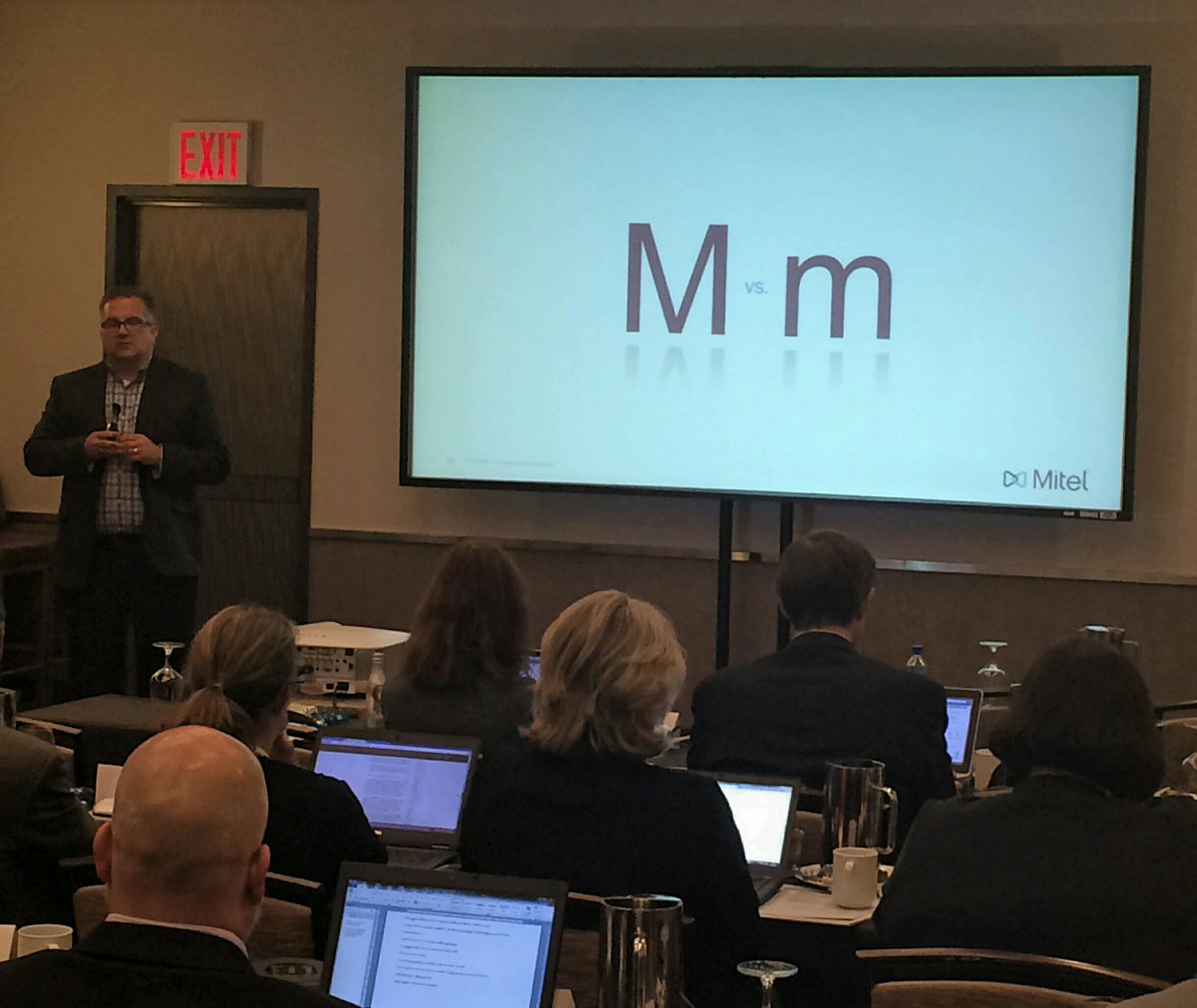 Mitel's tweet photo. Wes tells analysts that #Mitel is creating markets with a capital 'M' #AnalystDay2015 #MitelNext https://t.co/760EDPGAAO