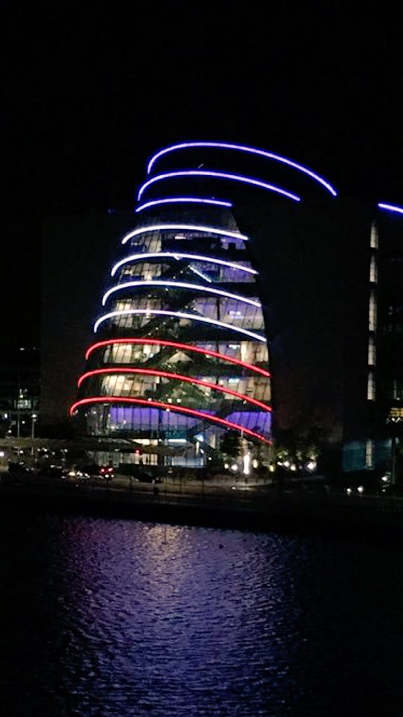 deric_tv's tweet photo. The French tricolour lighting up night sky at Convention centre #Dublin as mark of respect #ParisAttacks #Paris🇫🇷 https://t.co/LlVFpVTd9j