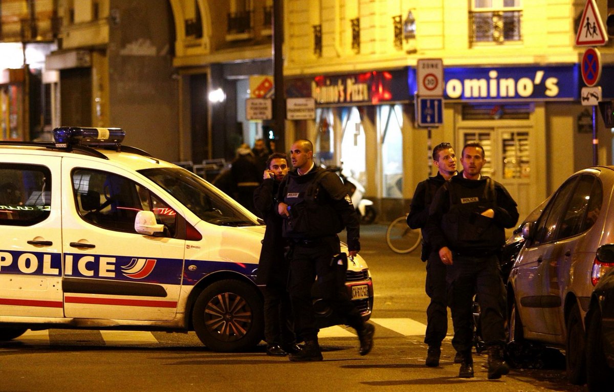 washingtonpost's tweet photo. Glimpses from the streets of the Paris attacks https://t.co/0J1wJPlMY6 https://t.co/nSlcHErfr5