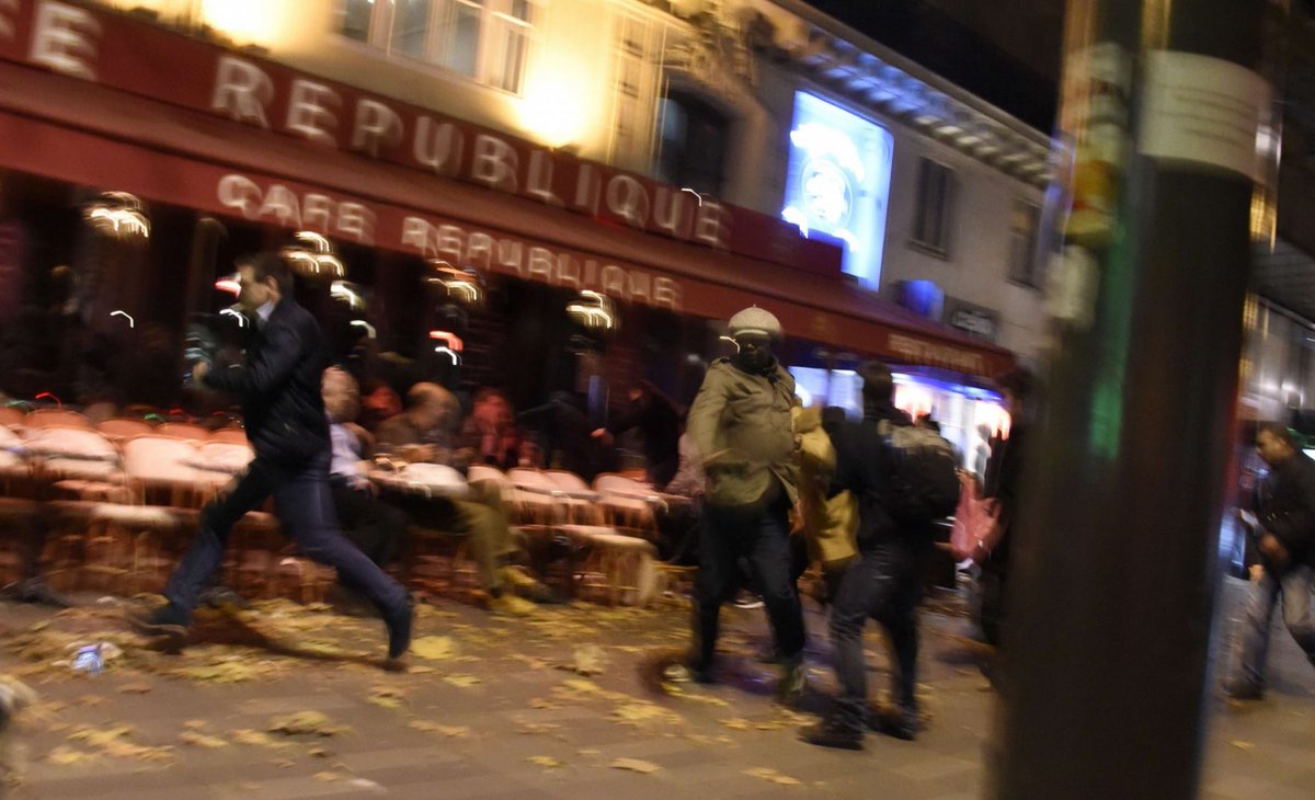 washingtonpost's tweet photo. Glimpses from the streets of the Paris attacks https://t.co/0J1wJPlMY6 https://t.co/nSlcHErfr5