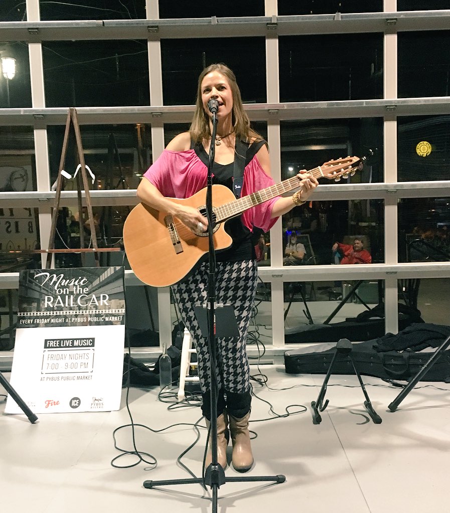 GoWenatchee's tweet photo. #NCW's @edenmoody playing music on the rail car at Pybus Public Market in #Wenatchee this evening. #ncwlive https://t.co/V5bPSx5DrZ