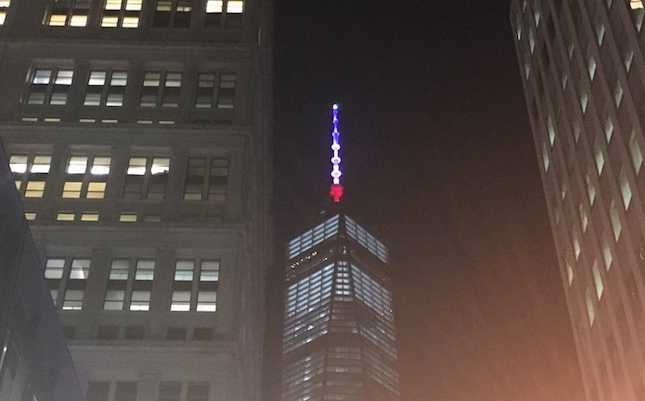 thehill's tweet photo. One World Trade Center lights up in colors of French flag https://t.co/cHB6KdKpyE https://t.co/y4wr4LCPwJ