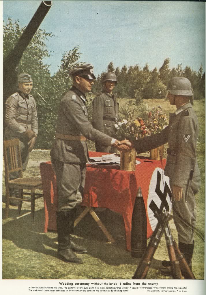 German officer shakes hands with a soldier at a wedding ceremony ( Summer 1942 )