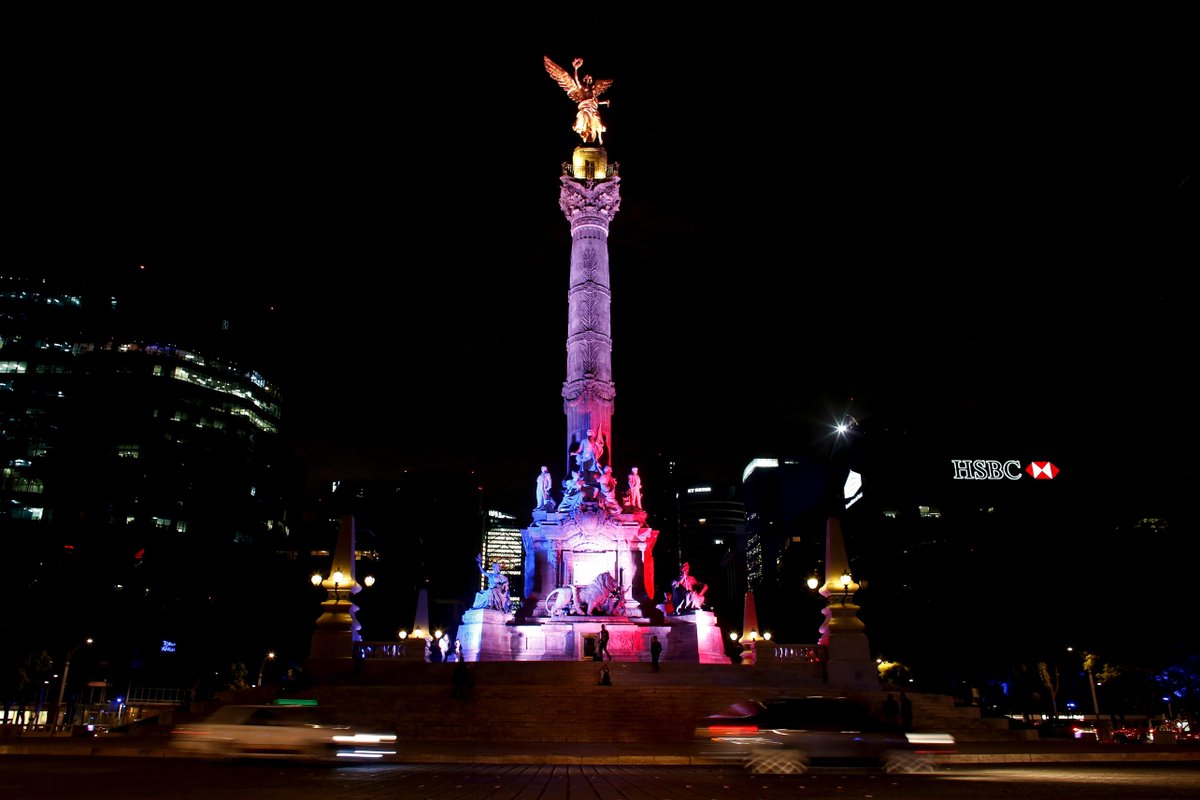 SkyNews's tweet photo. Monuments around the world turn their colours blue, white and red to show solidarity with France. #ParisAttacks https://t.co/DSvagi1Zic