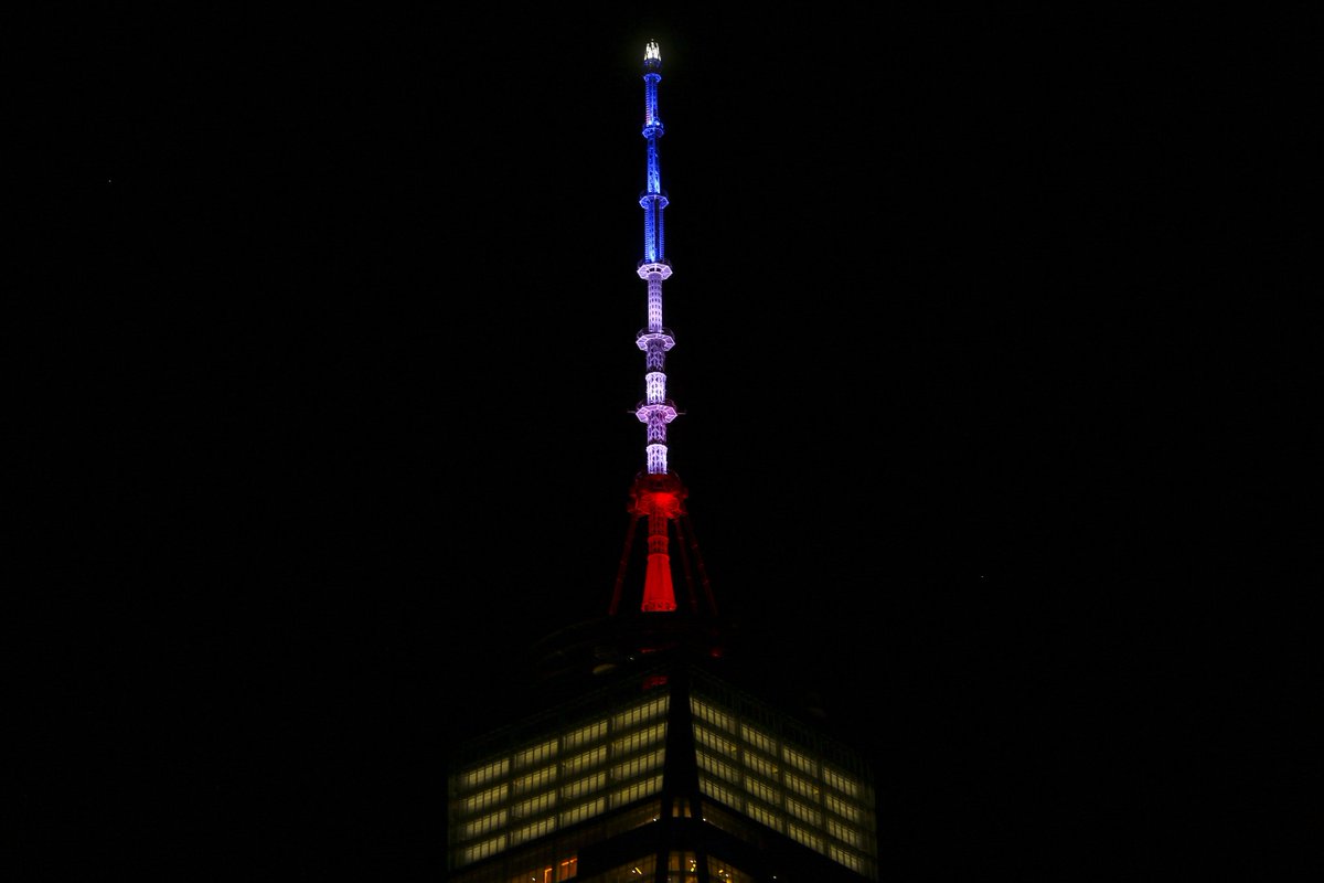 SkyNews's tweet photo. Monuments around the world turn their colours blue, white and red to show solidarity with France. #ParisAttacks https://t.co/DSvagi1Zic
