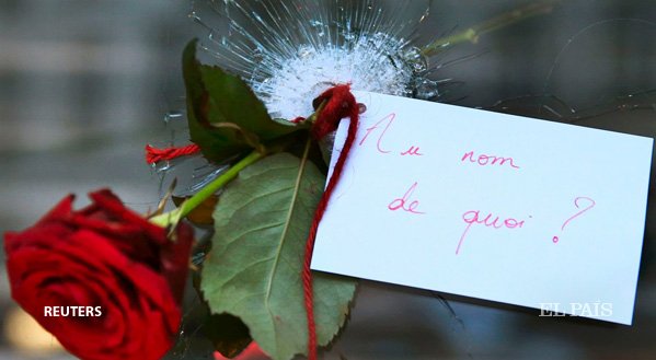 Alguien ha puesto una rosa en el hueco de una bala en la ventana de un restaurante en #París cort.as/ZAMh