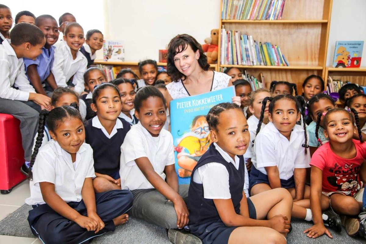 <a href="/milanmurray/">milan murray</a> introducing her book "Pieter Kokkewieter" to the children at the project <a href="/WorldVisionSA/">World Vision South Africa</a>