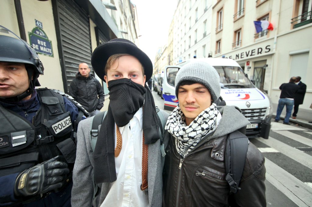 jonathoncomfort's tweet photo. Police use tear gas on protestors on the street near Place de la République. #COP21 #resist #decolonize https://t.co/wwkbgAISZ2