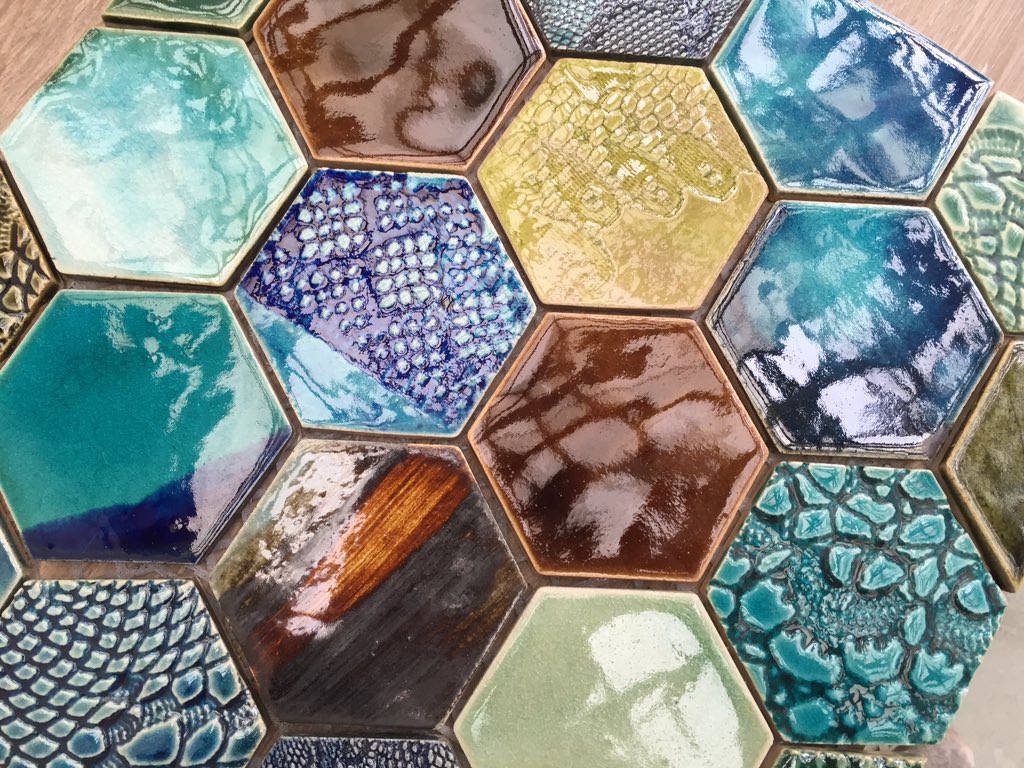 casaceramica's tweet photo. Fantastic to meet Guy &amp; Imogen @guymitchellart today. STUNNING tile collections, can you spot the one with the face? https://t.co/bJjr6LB8vU