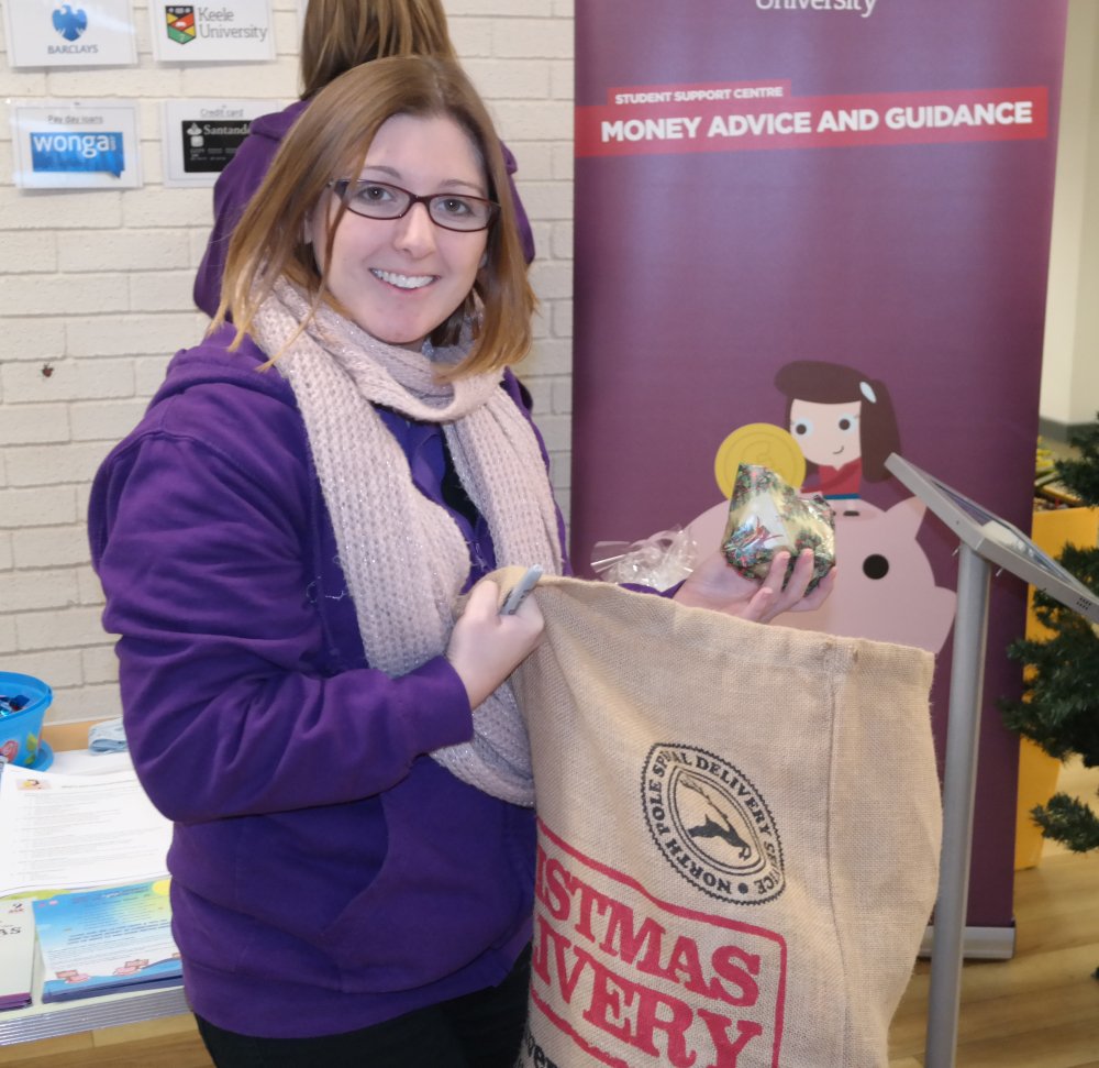LifeAtKeele's tweet photo. We've had a lovely day giving out Christmas Presents to students working hard in the Library :) #KeeleMoneyWeek https://t.co/oHQPV2869C