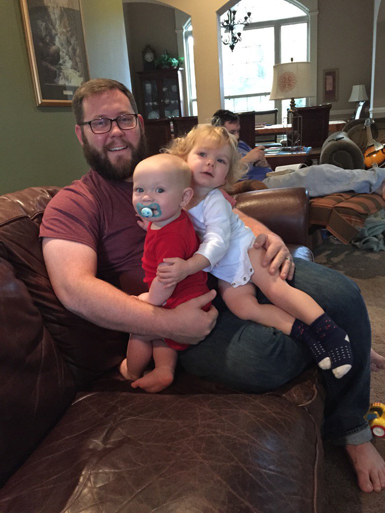 belliff's tweet photo. A tale of two dads: one working, the other reading the Word in prep for his new child coming! https://t.co/5hkLNseI6q